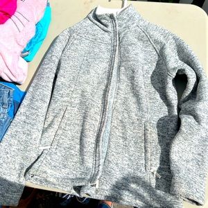 North Face zip up jacket.